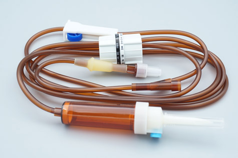 The Past and Present of the Huber Needle for Infusion Ports